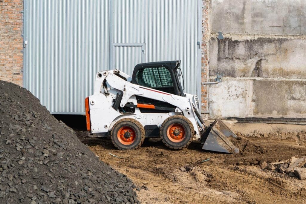 Onsite photograph of wheel skid steer loader.