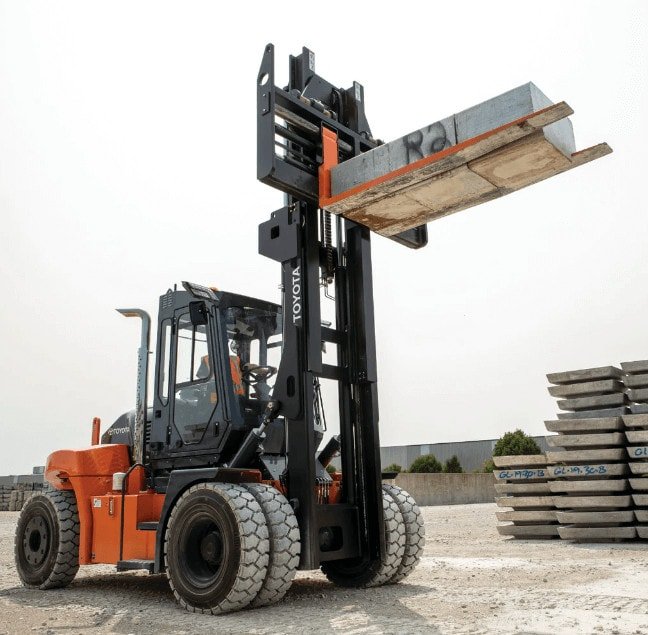 Photograph of a forklift dealing with material
