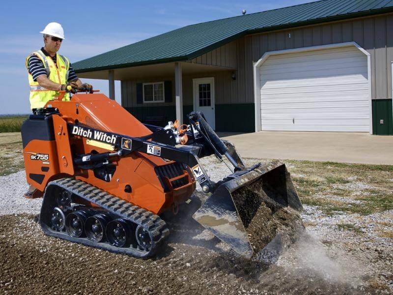 man operating a loader