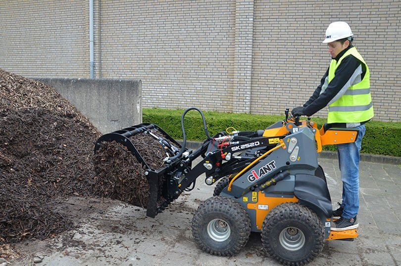 man operating loader