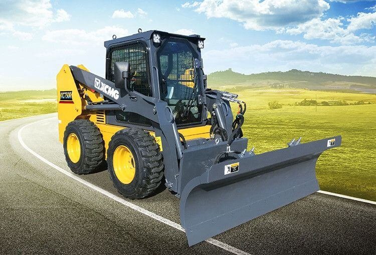 Mini skid steer loader in the field