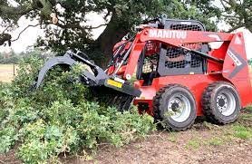 Red skid steer loader